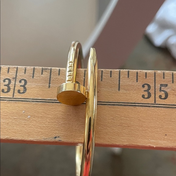 Elegant Gold Nail Bracelet - Picture 2 of 3